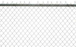 A chain link fence in Peoria IL against a white background