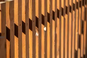 A wooden fence is seen. How Do I Maintain My Wood Fence? Call Hohulin Fence in Peoria IL.